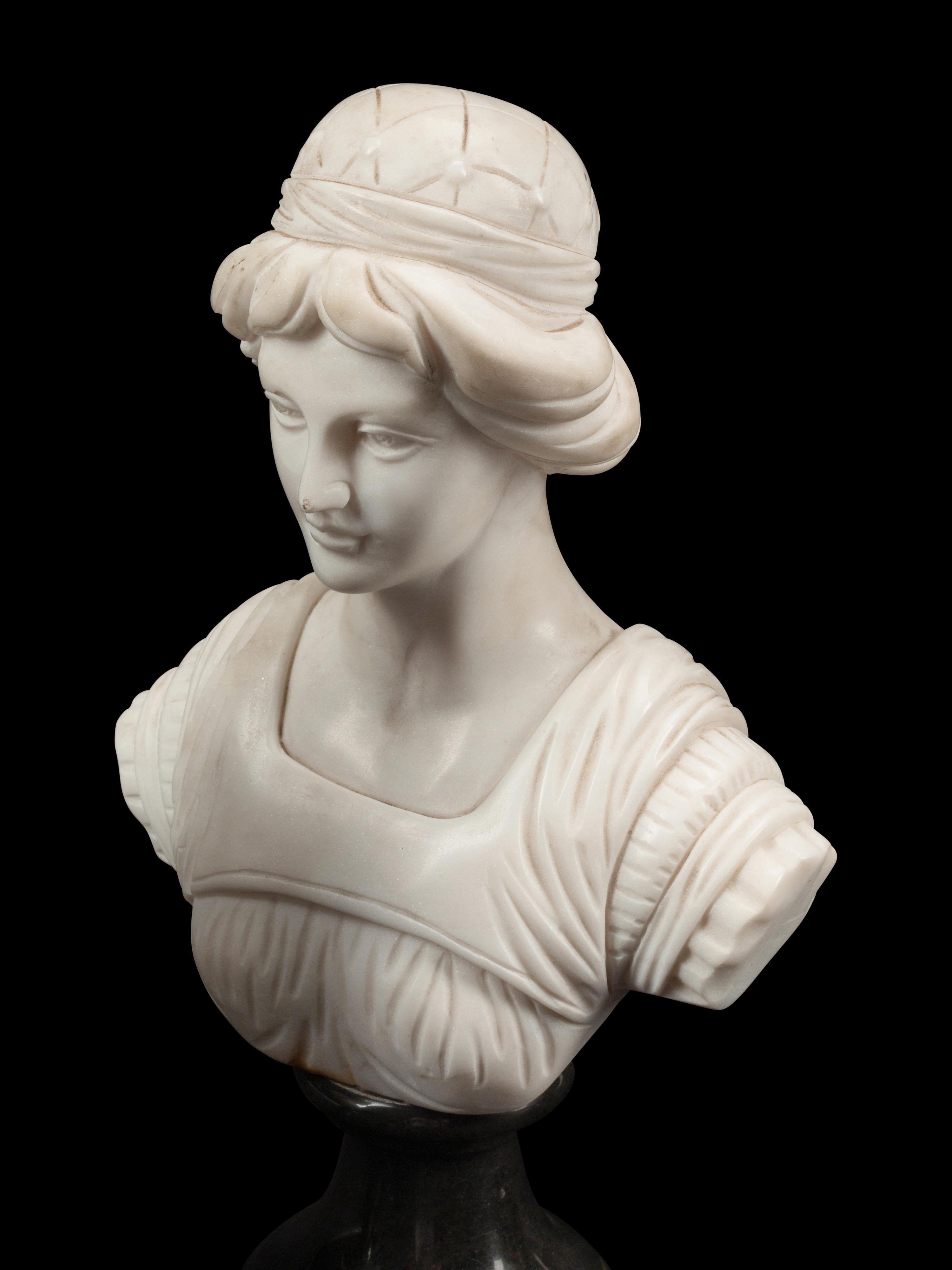 A Set of Four Bi-Color Marble Busts
