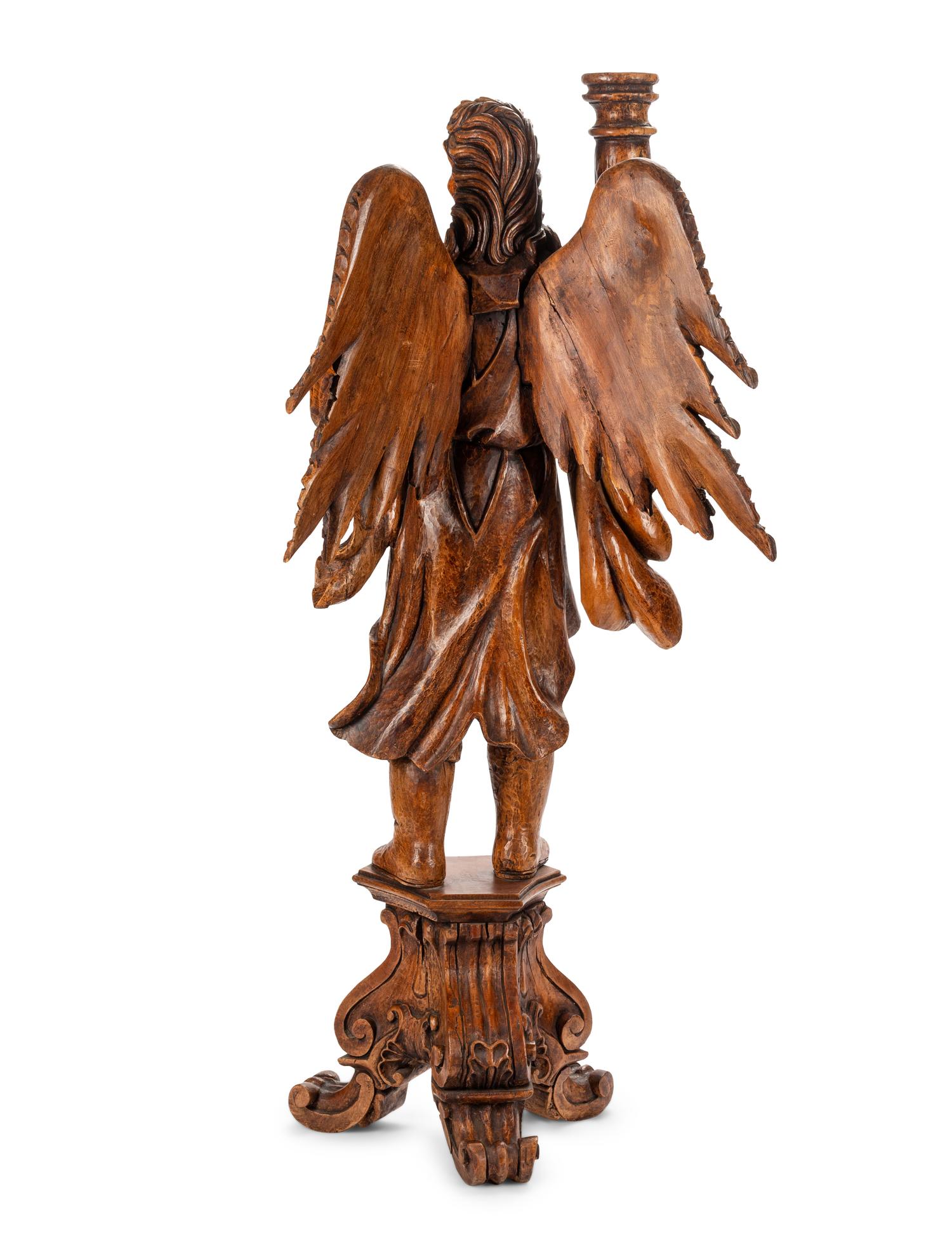 A Pair of Italian Carved Wood Figural Torchères