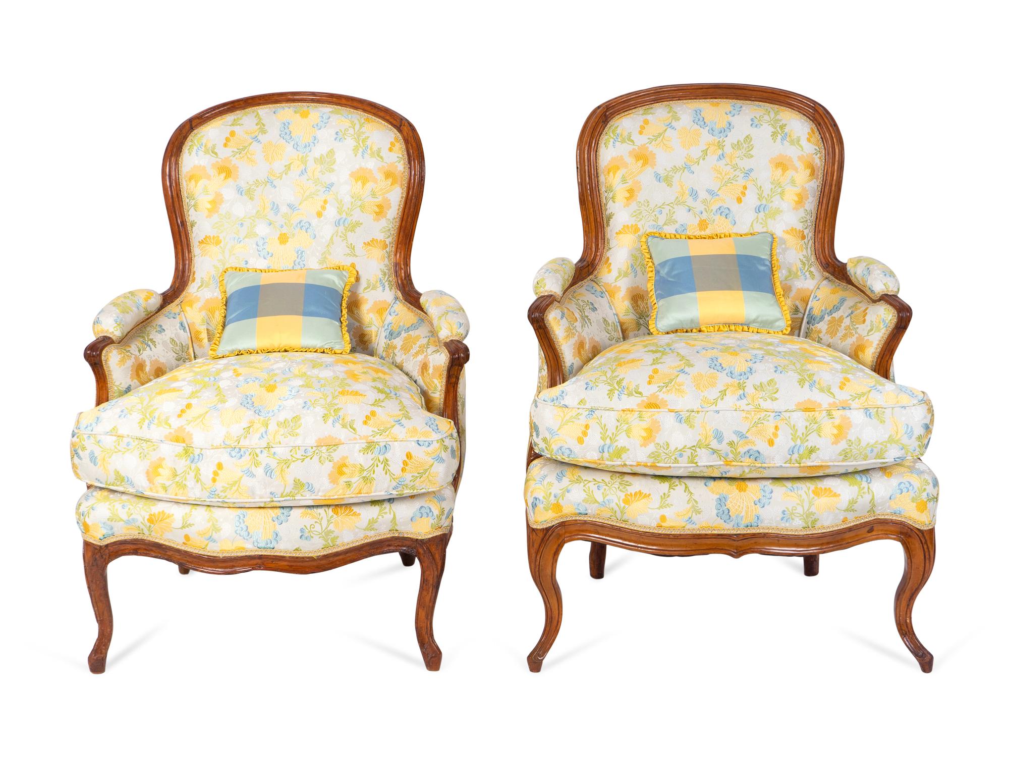 A Pair of Louis XV Style Carved Walnut Bergeres — 19TH CENTURY