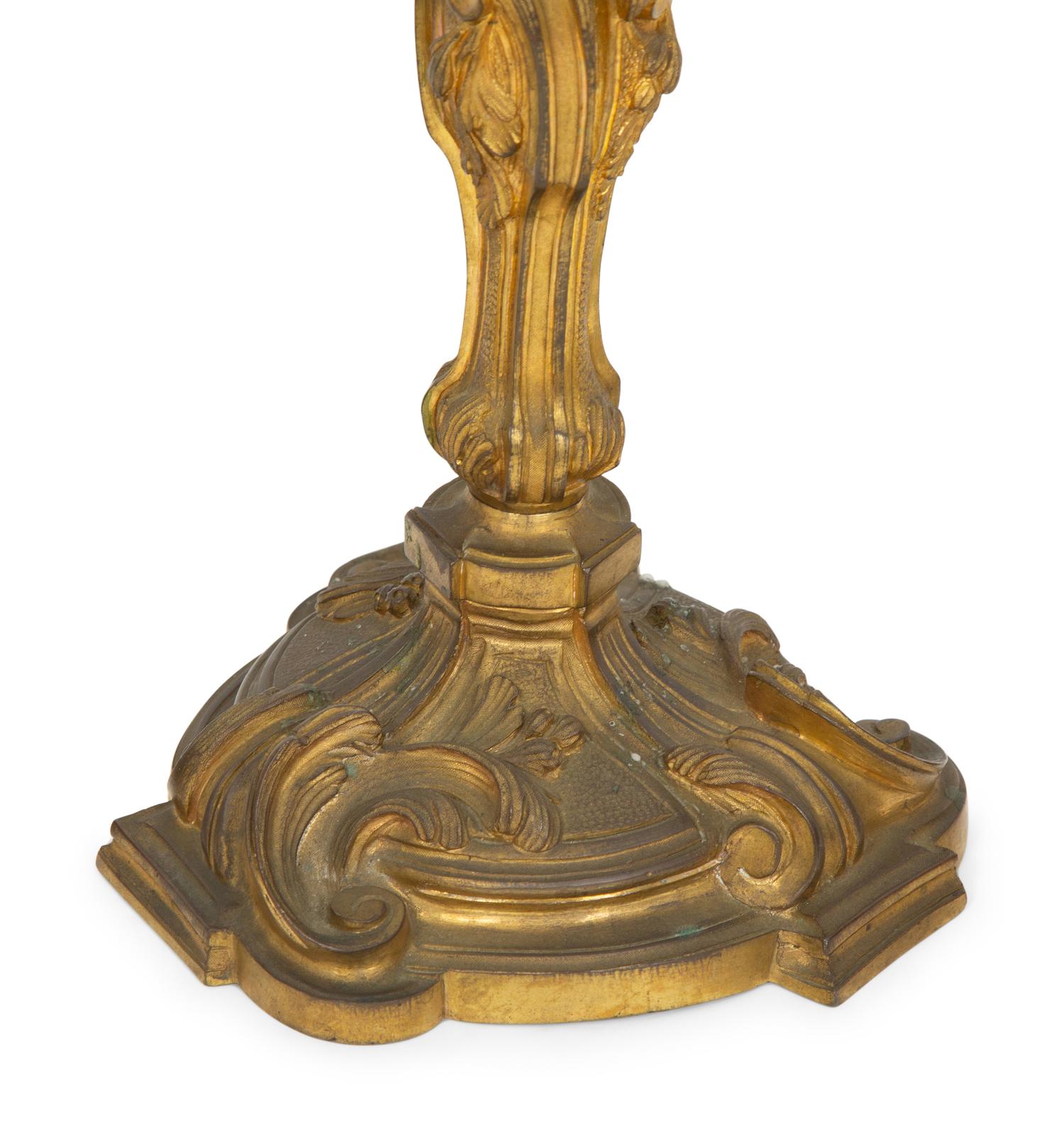 Two Pairs of Louis XV Style Gilt Bronze Candlesticks