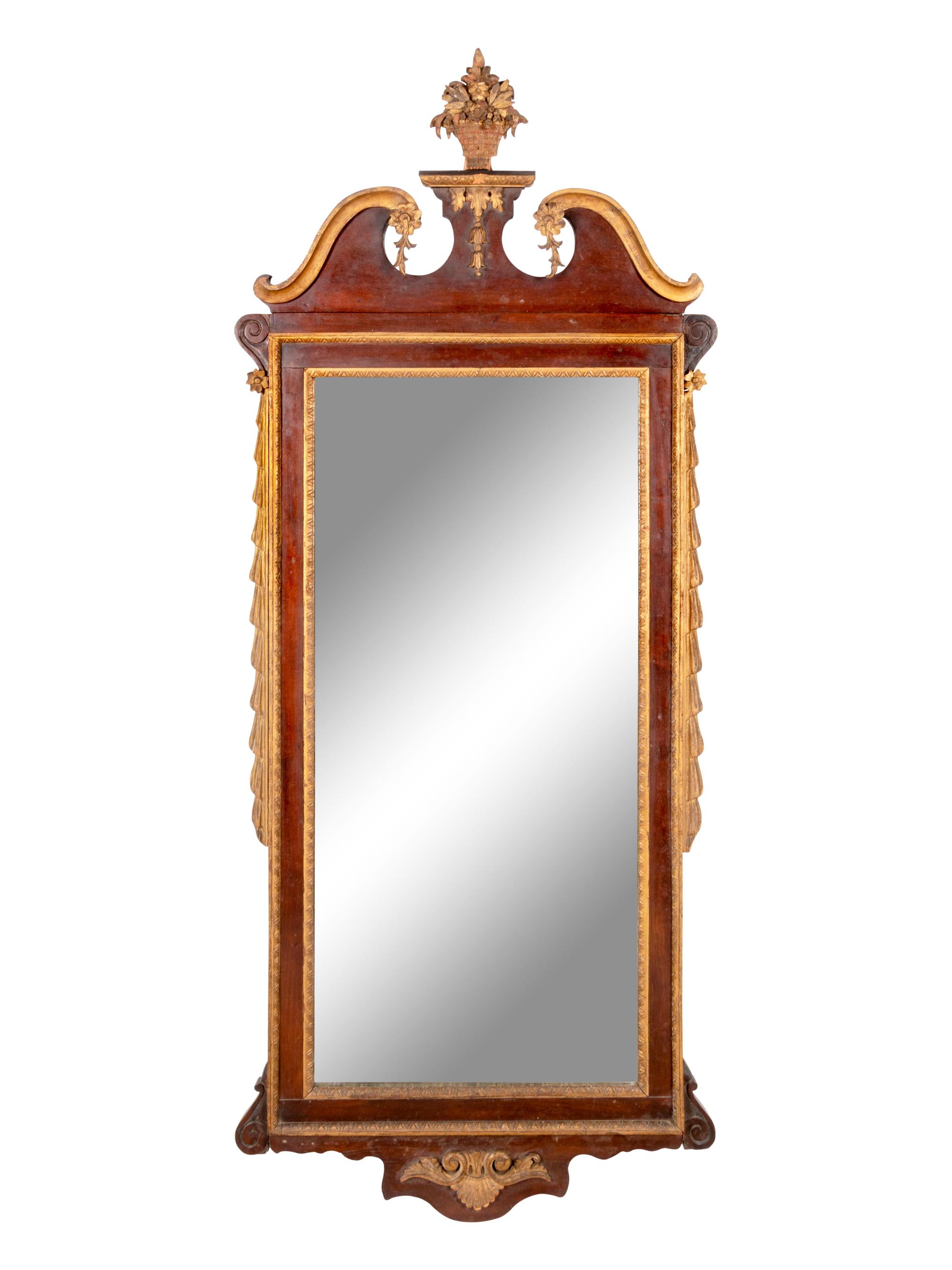 A George III Style Mahogany and Parcel Gilt Mirror