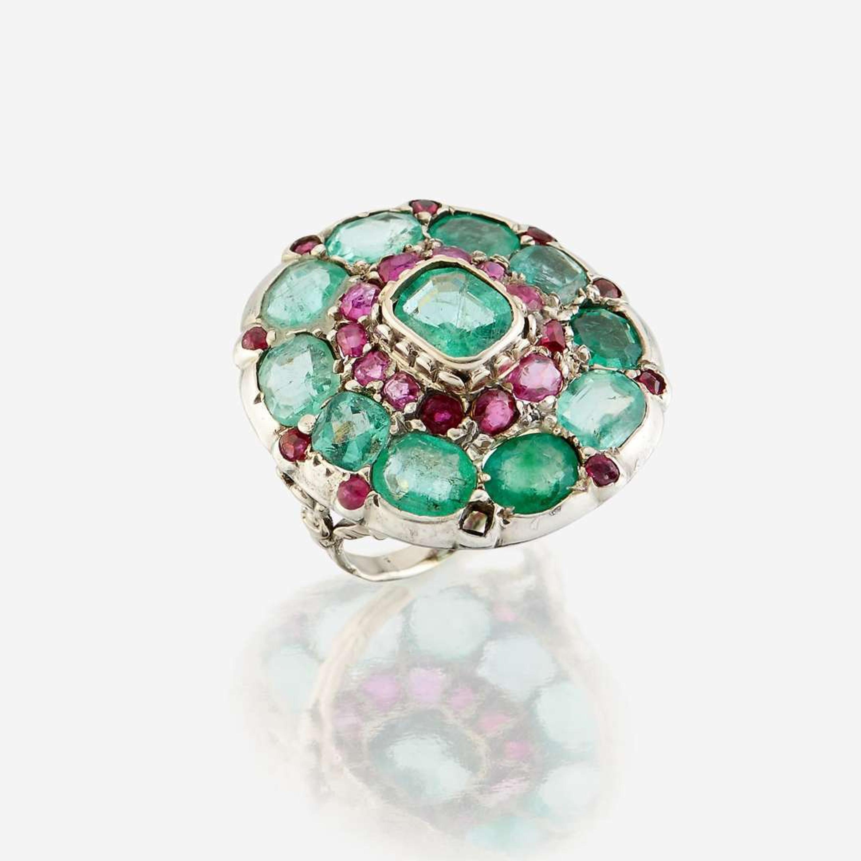 A green beryl, ruby, and ten karat white gold ring