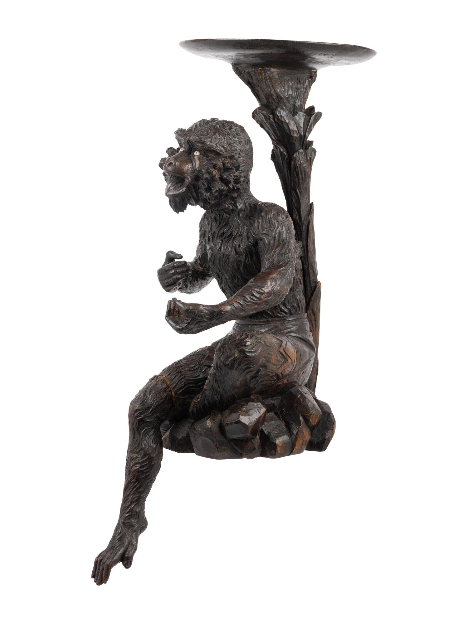 A Venetian Style Carved Walnut Figural Pedestal