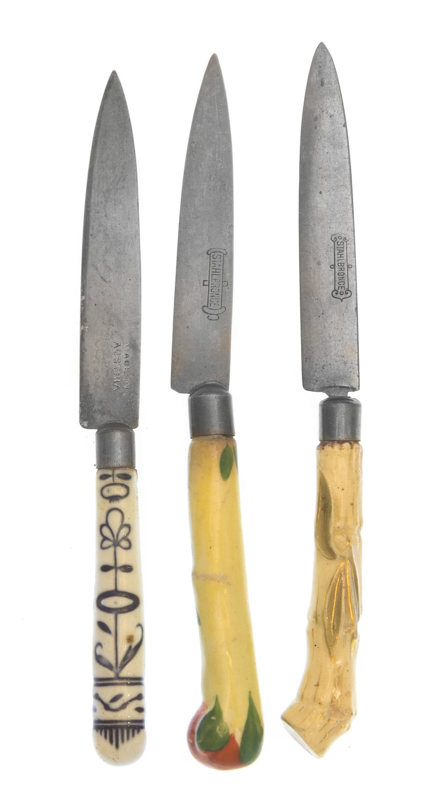 A Group of Austrian Ceramic Handled Knives, Stahlbronce and other makers, with gilt metal implements.
