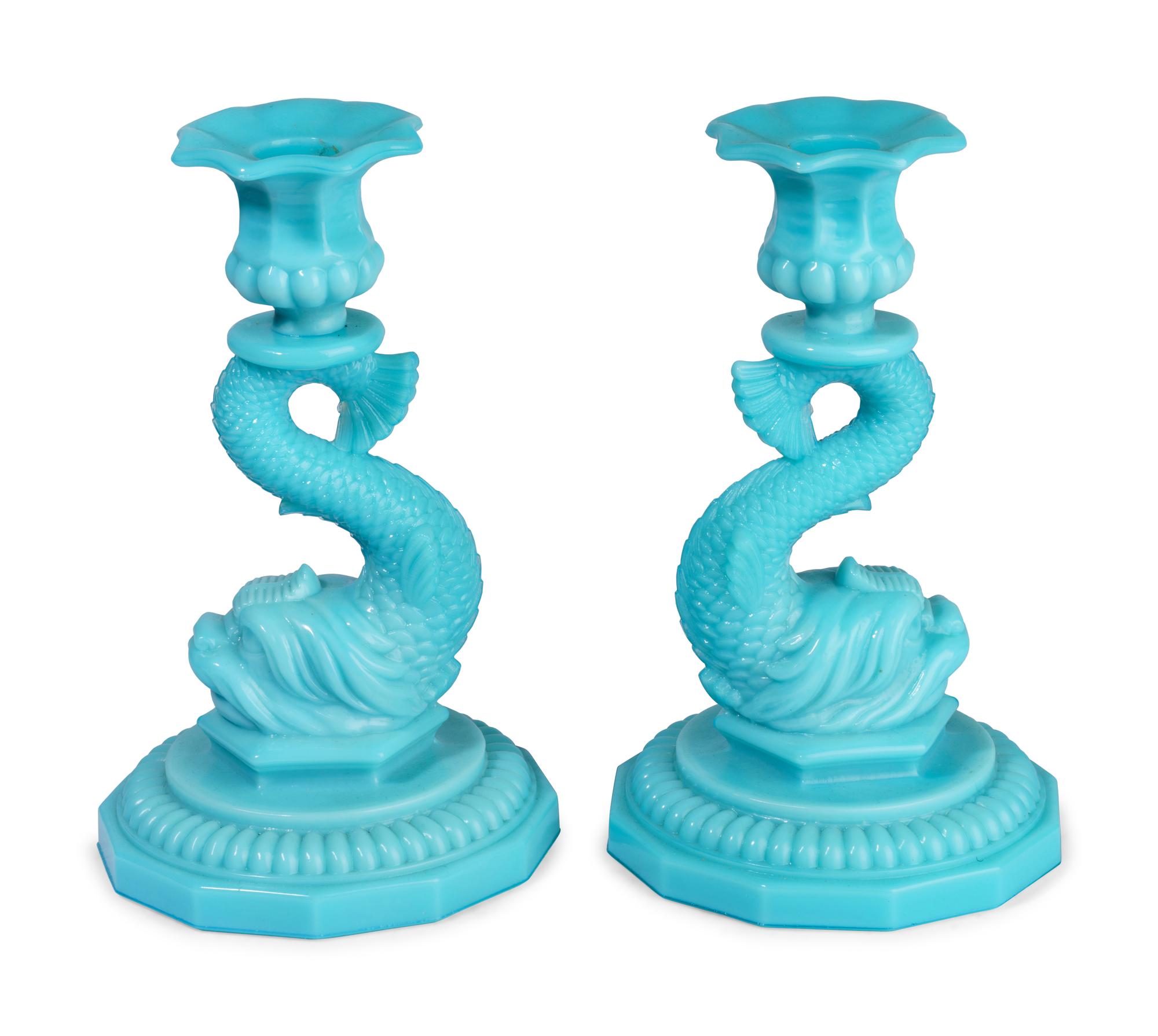 A Pair of Glass Dolphin Candlesticks