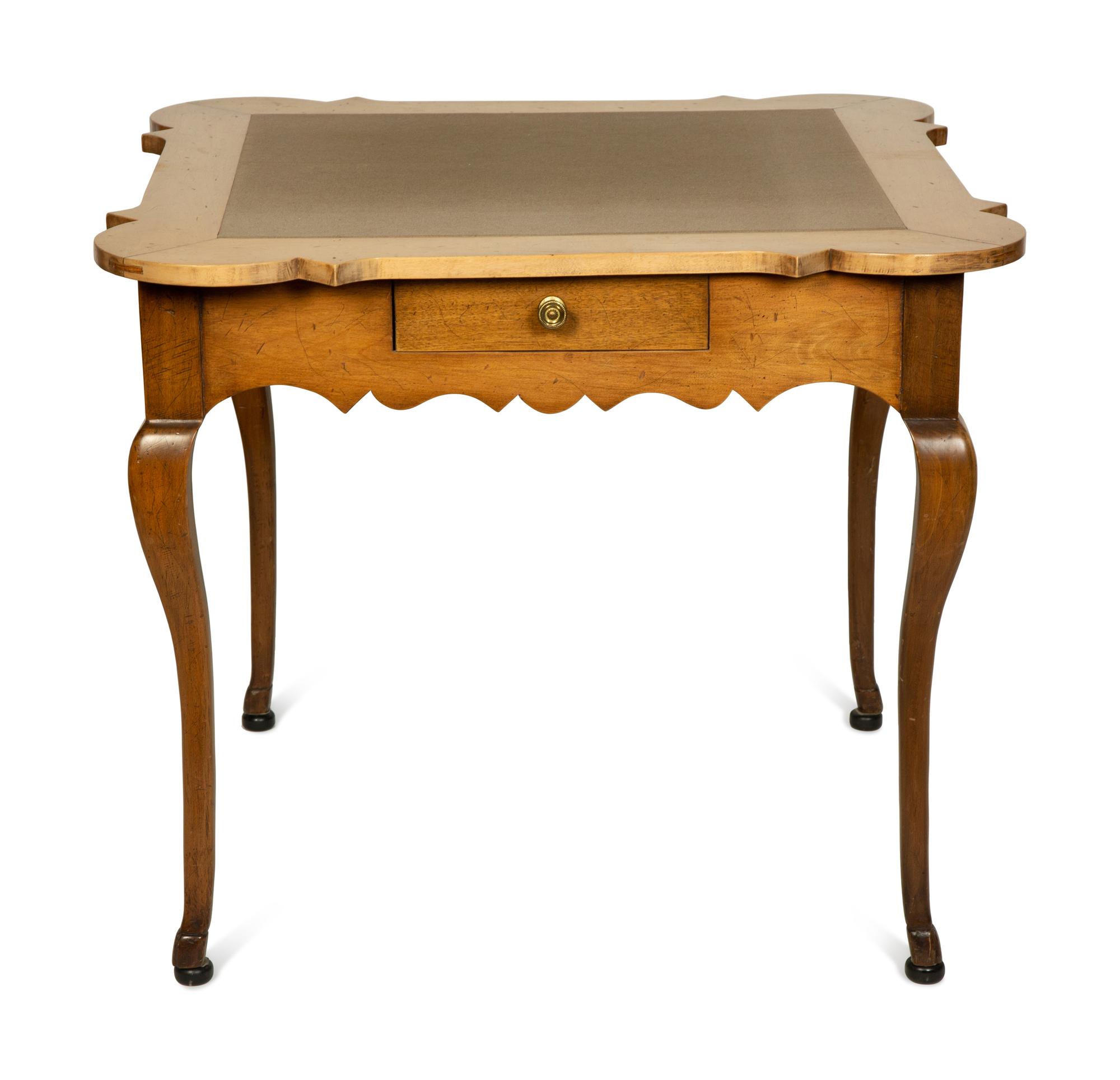 A Louis XV Provincial Style Walnut Game Table