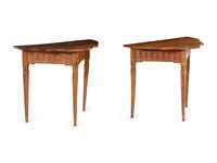 A Pair of Continental Carved Fruitwood Console Tables