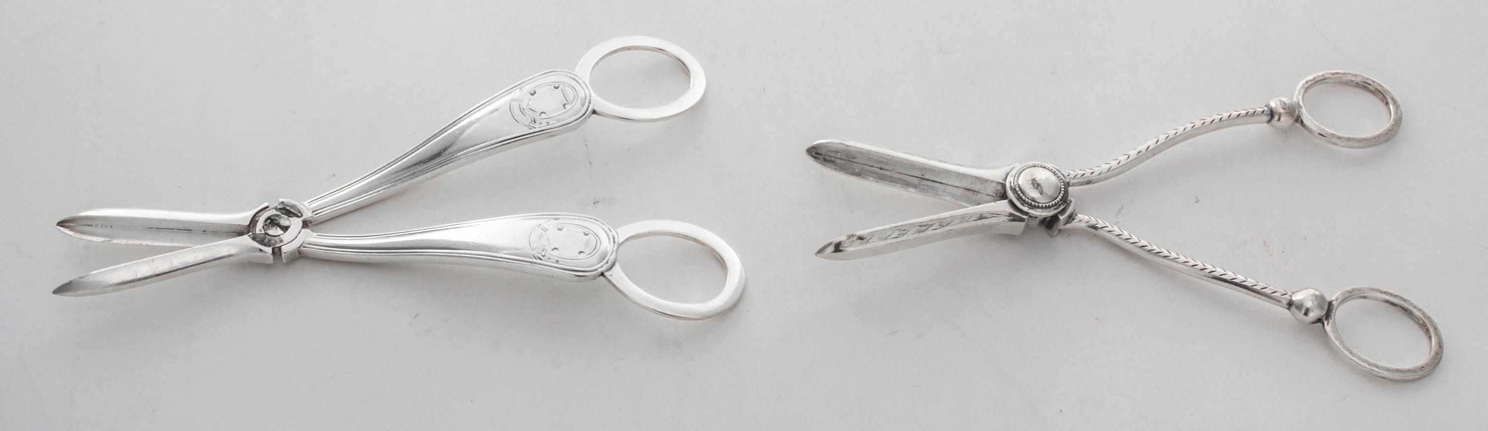 A Pair of English Silver Grape Shears, Martin, Hall & Co., Sheffield, Circa 1870, together with an associated silver-plate pair.