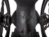 A Landers, Frary & Clark Cast Iron Coffee Mill with an Eagle Finial