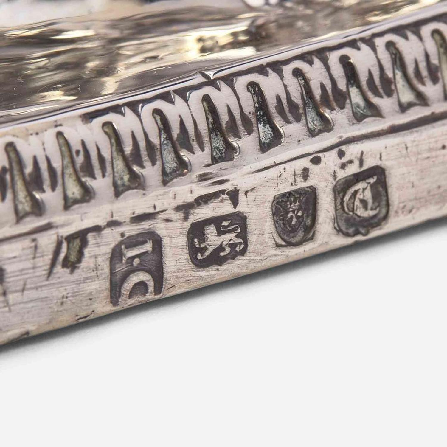 A set of four George III sterling silver weighted candlesticks John Carter II, London, 1774