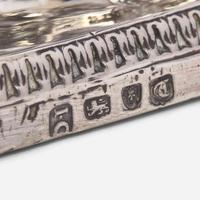 A set of four George III sterling silver weighted candlesticks John Carter II, London, 1774