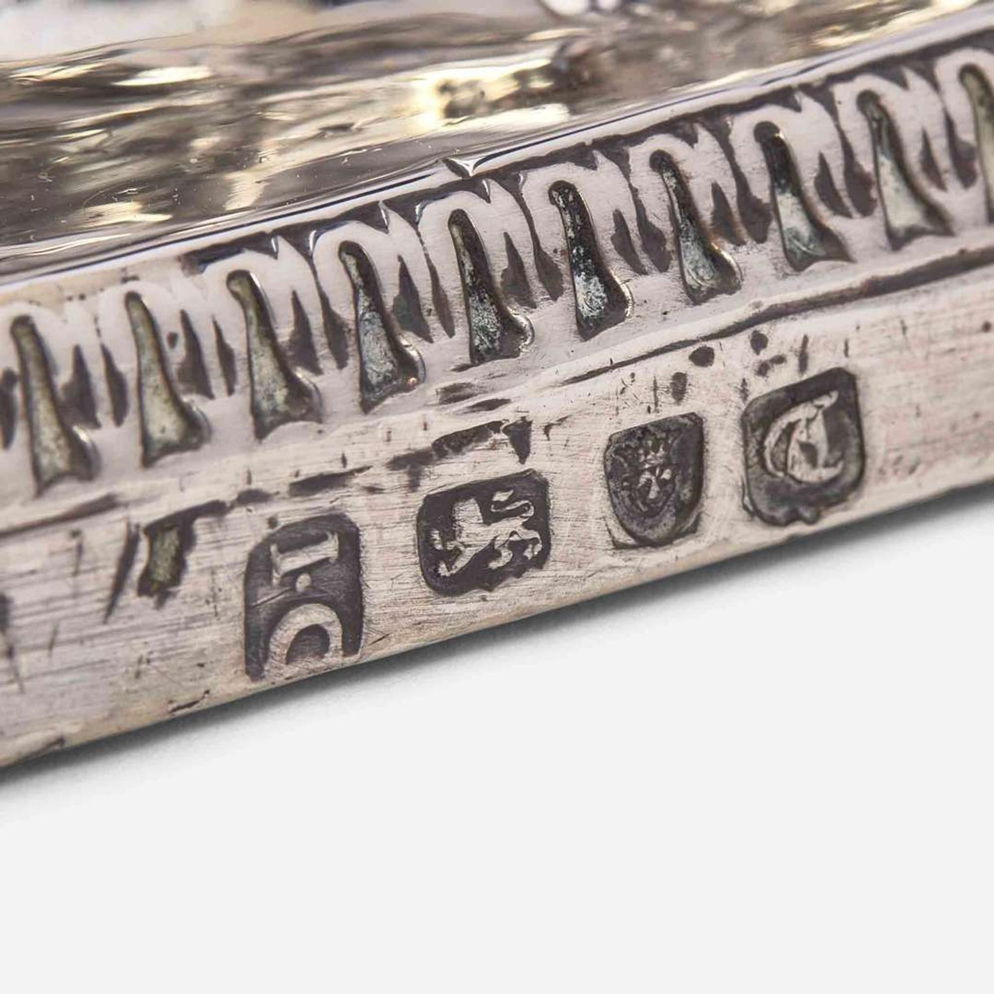 A set of four George III sterling silver weighted candlesticks John Carter II, London, 1774