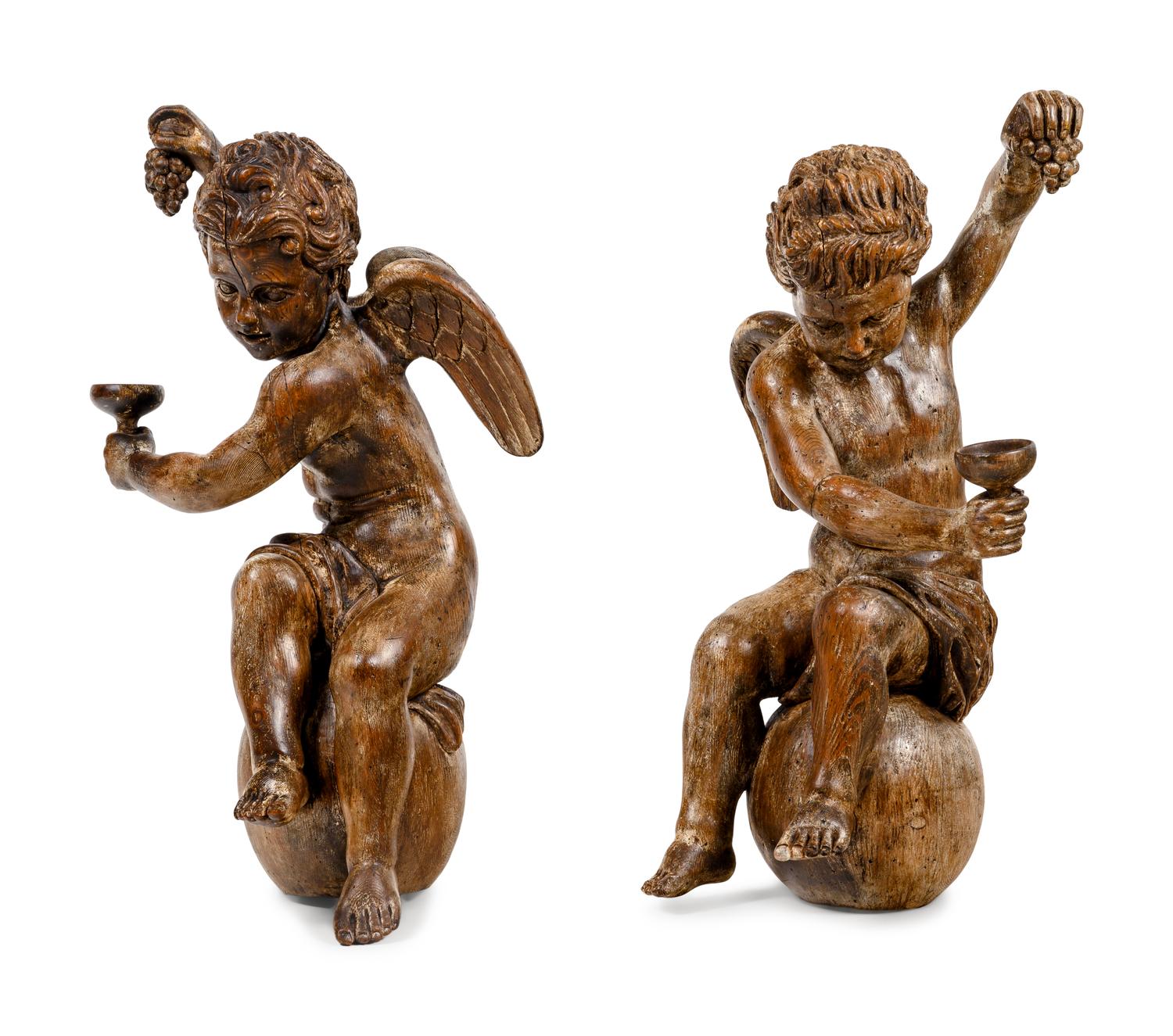 A Pair of Continental Carved Oak Cherubs