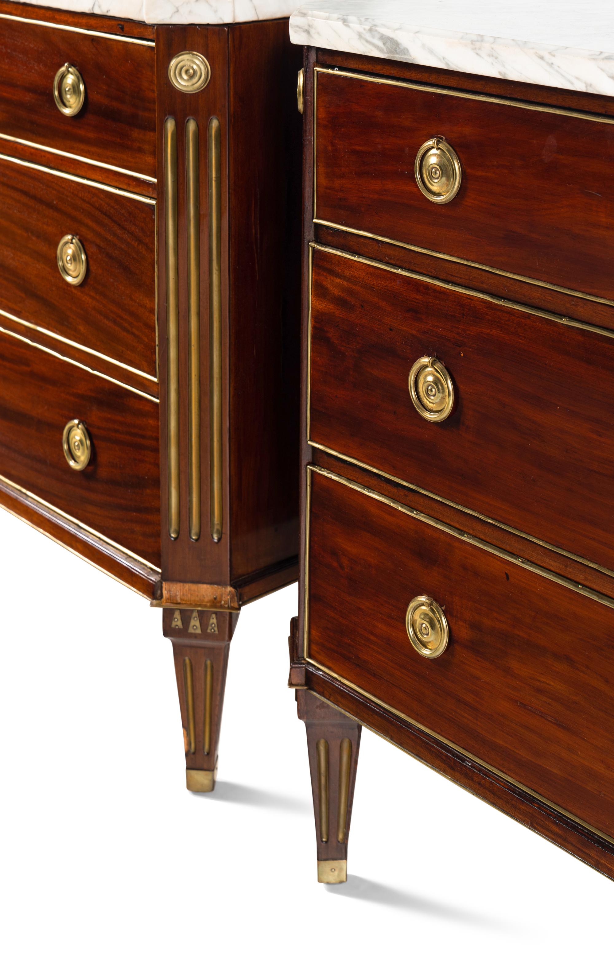 A Pair of Swedish Neoclassical Gilt Metal Mounted Mahogany Marble-Top Commodes