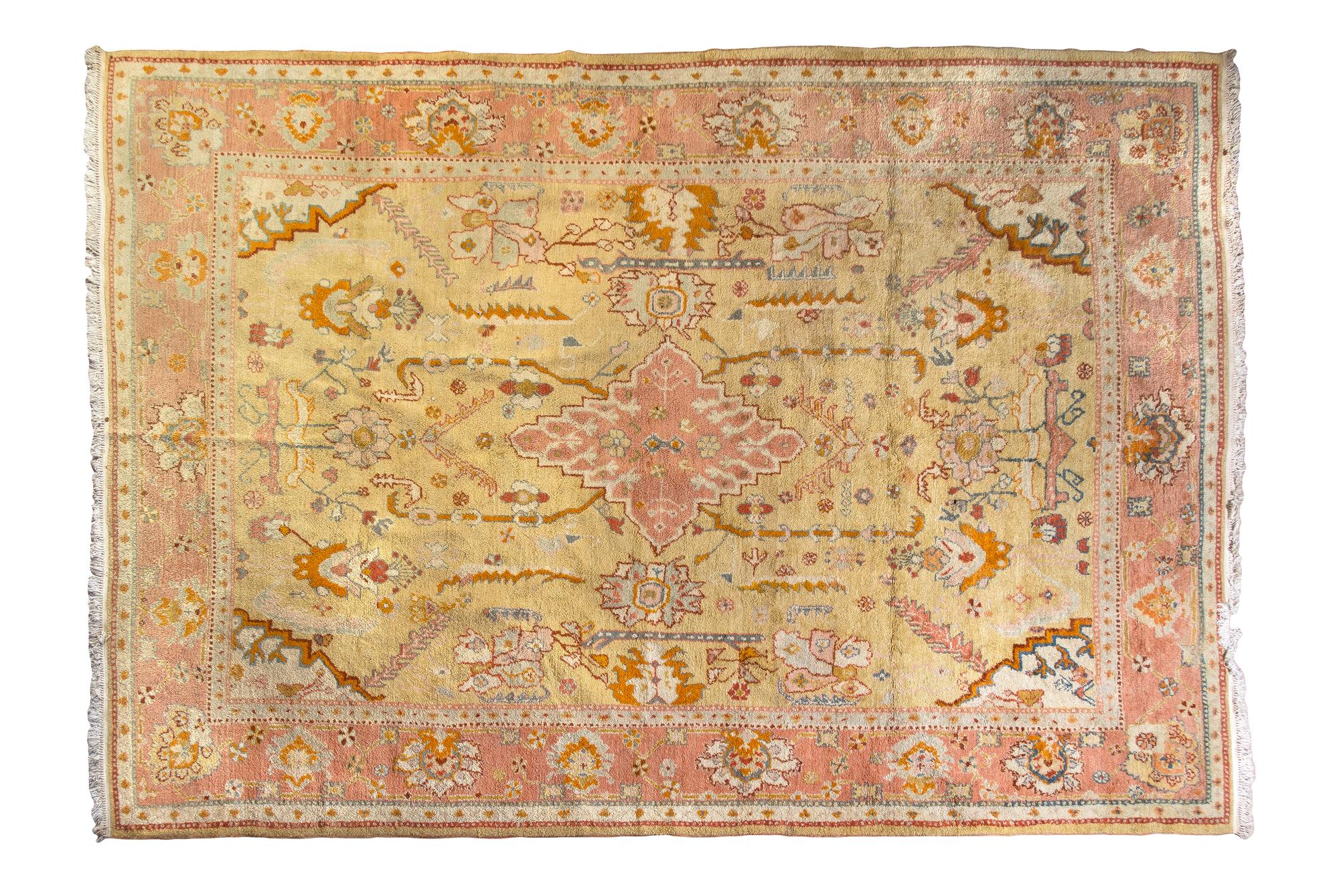 An Oushak or Heriz Wool Rug, MID-20TH CENTURY, 17 feet x 11 feet 8 inches. — MID-20TH CENTURY