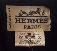 An Hermes Black Wool Skirt Suit, Size 40.