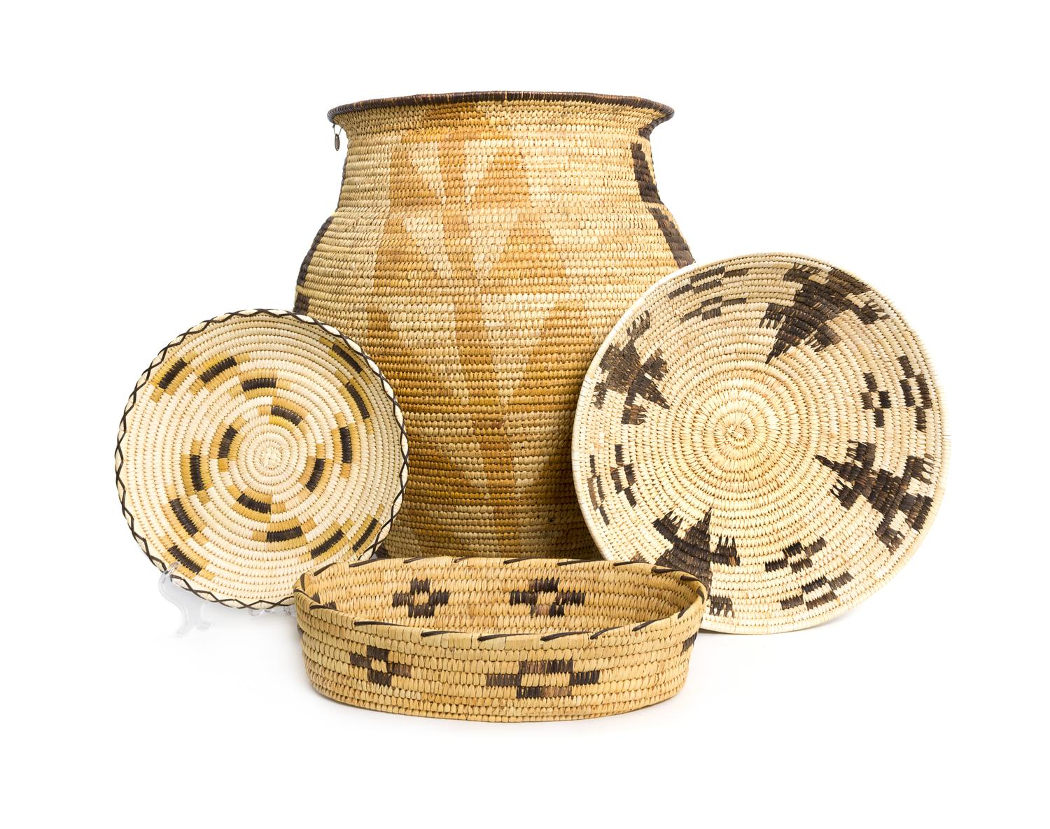 A Group of Fourteen Tohono O'odham Baskets Height of tallest 16 3/4 inches.