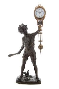 A German Metal Figural Clock Height 14 1/2 inches.