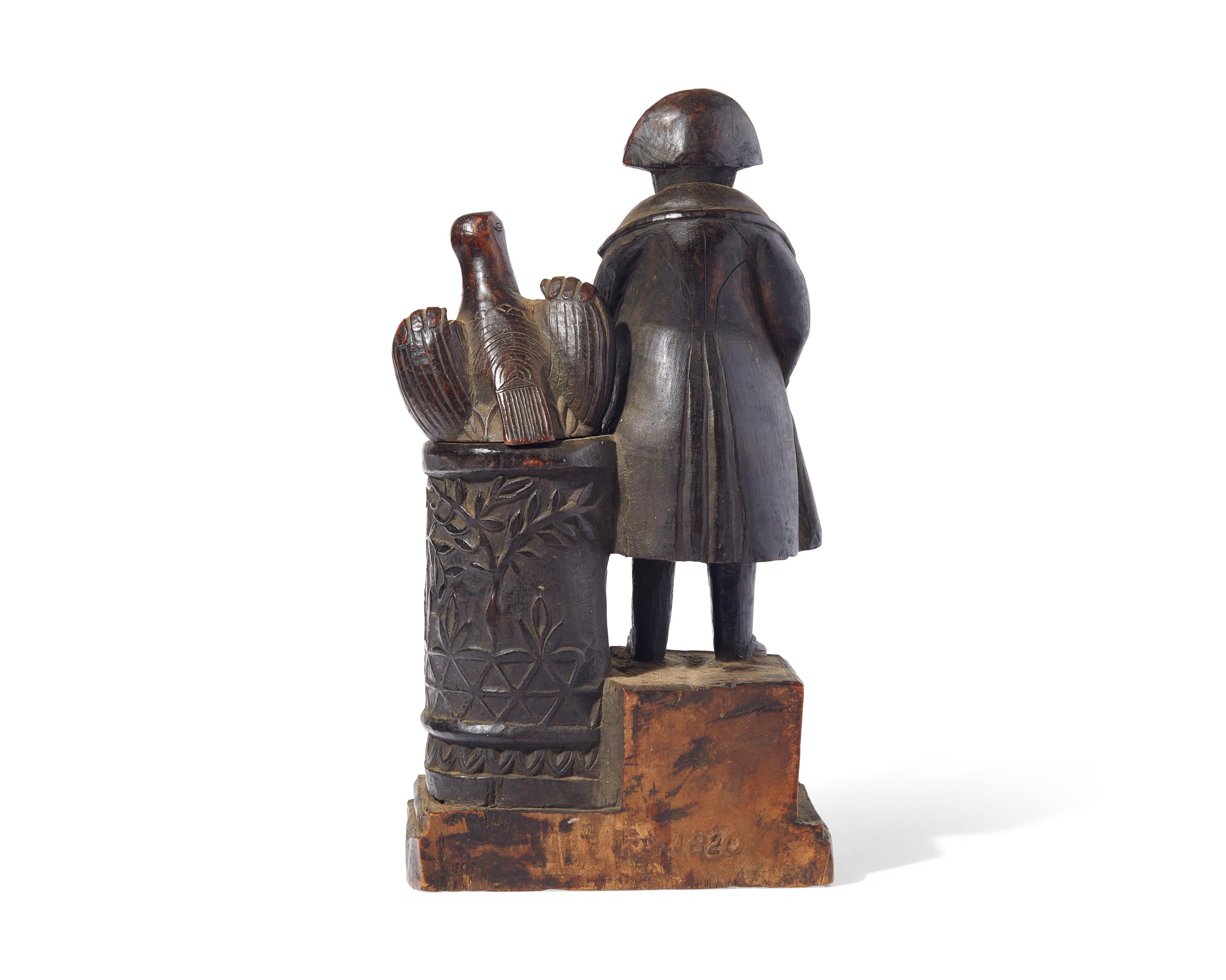 A Carved Wood Watch Hutch in the Form of Napoleon with Eagle