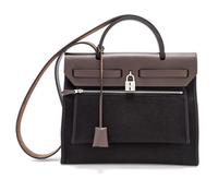An Hermes Black Canvas and Chocolate Vache Herbag Zip PM 31, 12.25" x 10" x 4"; Strap drop: 19"; Handle drop: 4.5".