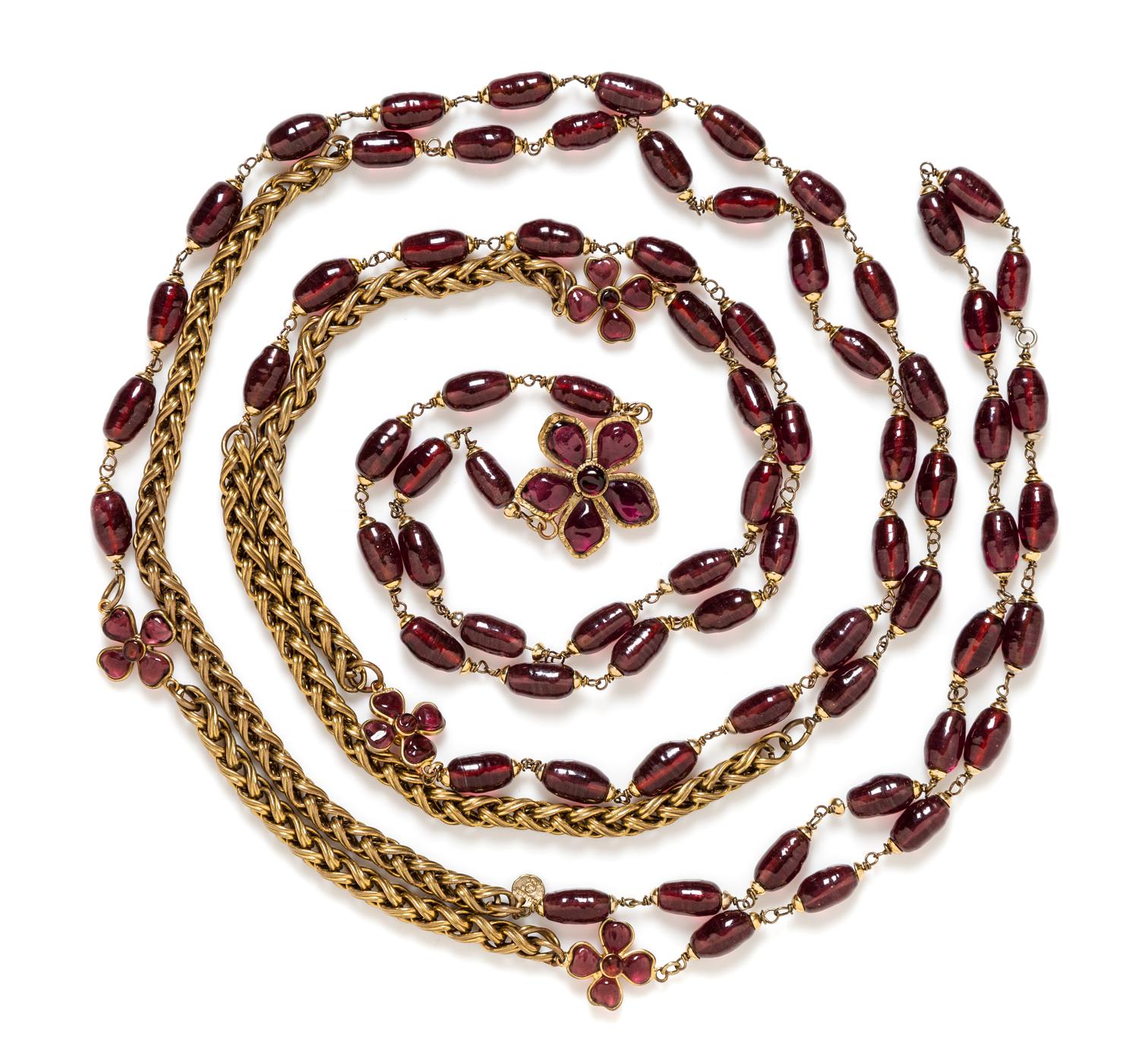A Chanel Purple Gripoix and Goldtone Necklace, 104" long.