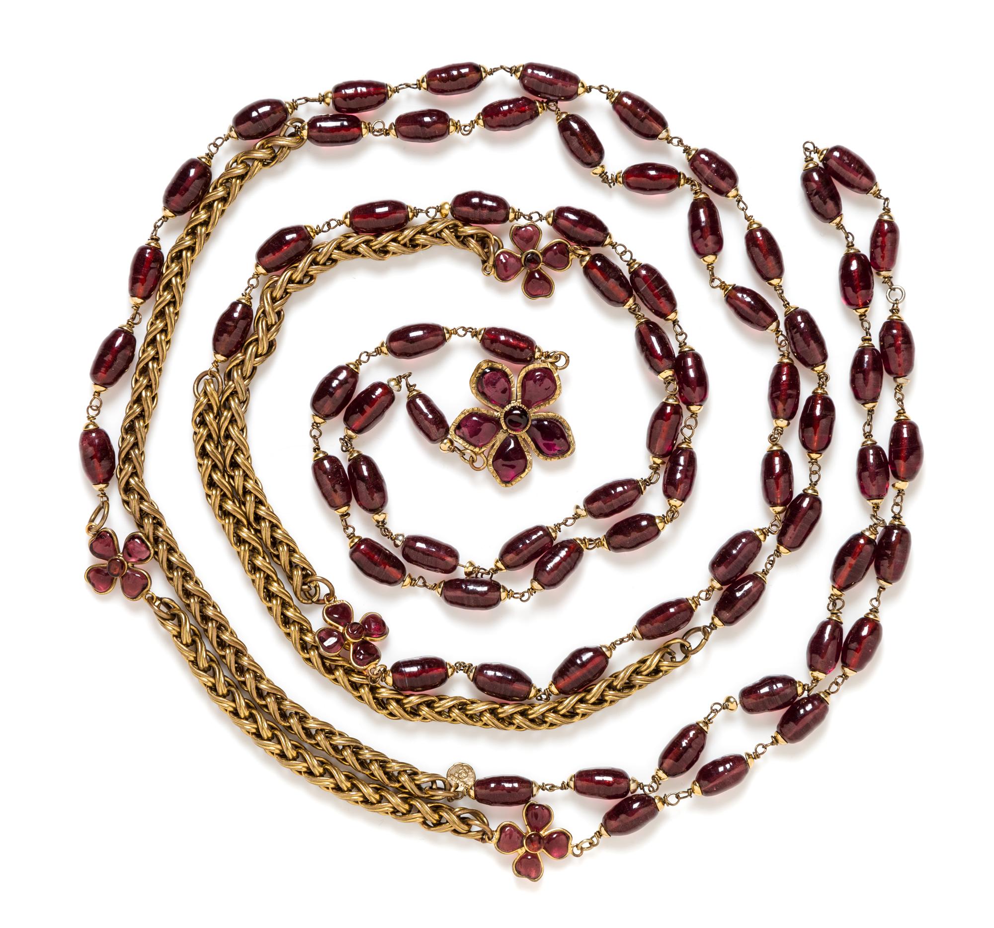 A Chanel Purple Gripoix and Goldtone Necklace, 104" long.