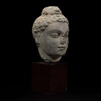 A carved schist head of a Buddha, Gandhara 健陀罗片岩佛首 3rd - 5th Century or earlier ????????