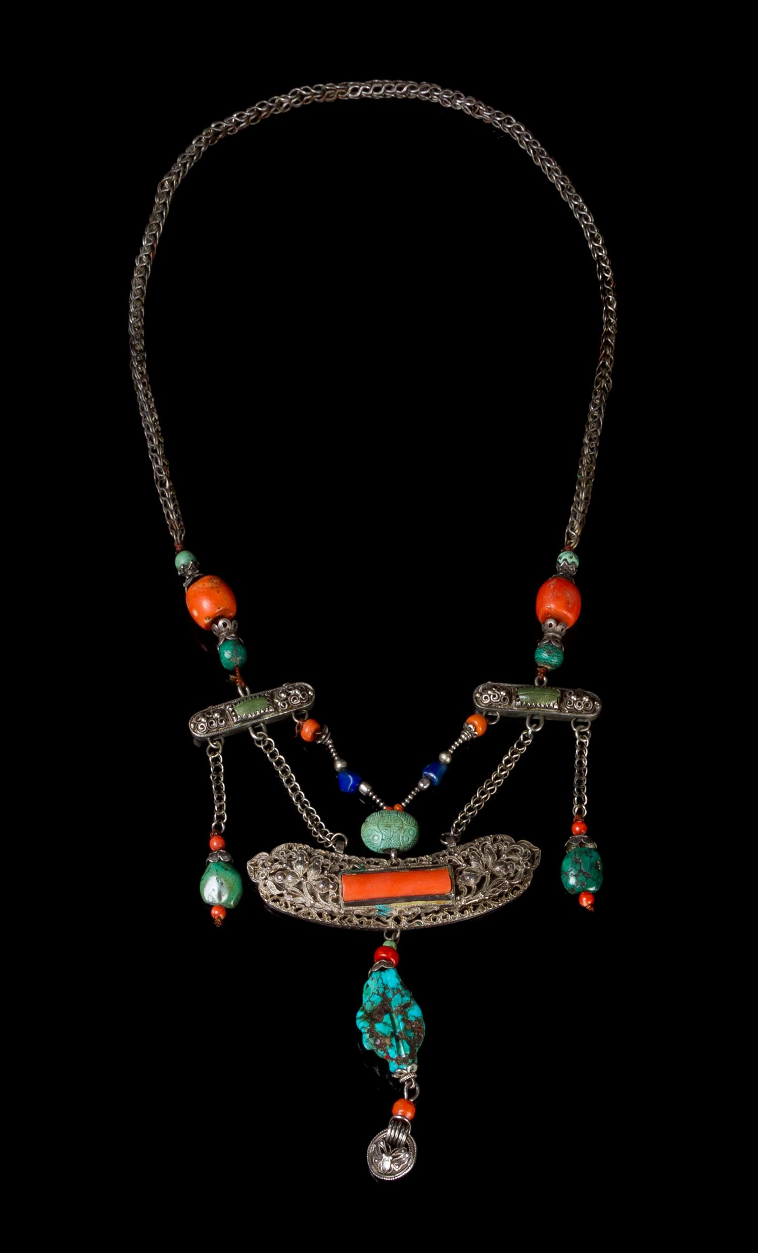 A Tibetan Silver and Hardstone Necklace Length 23 inches.