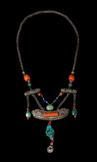 A Tibetan Silver and Hardstone Necklace Length 23 inches.