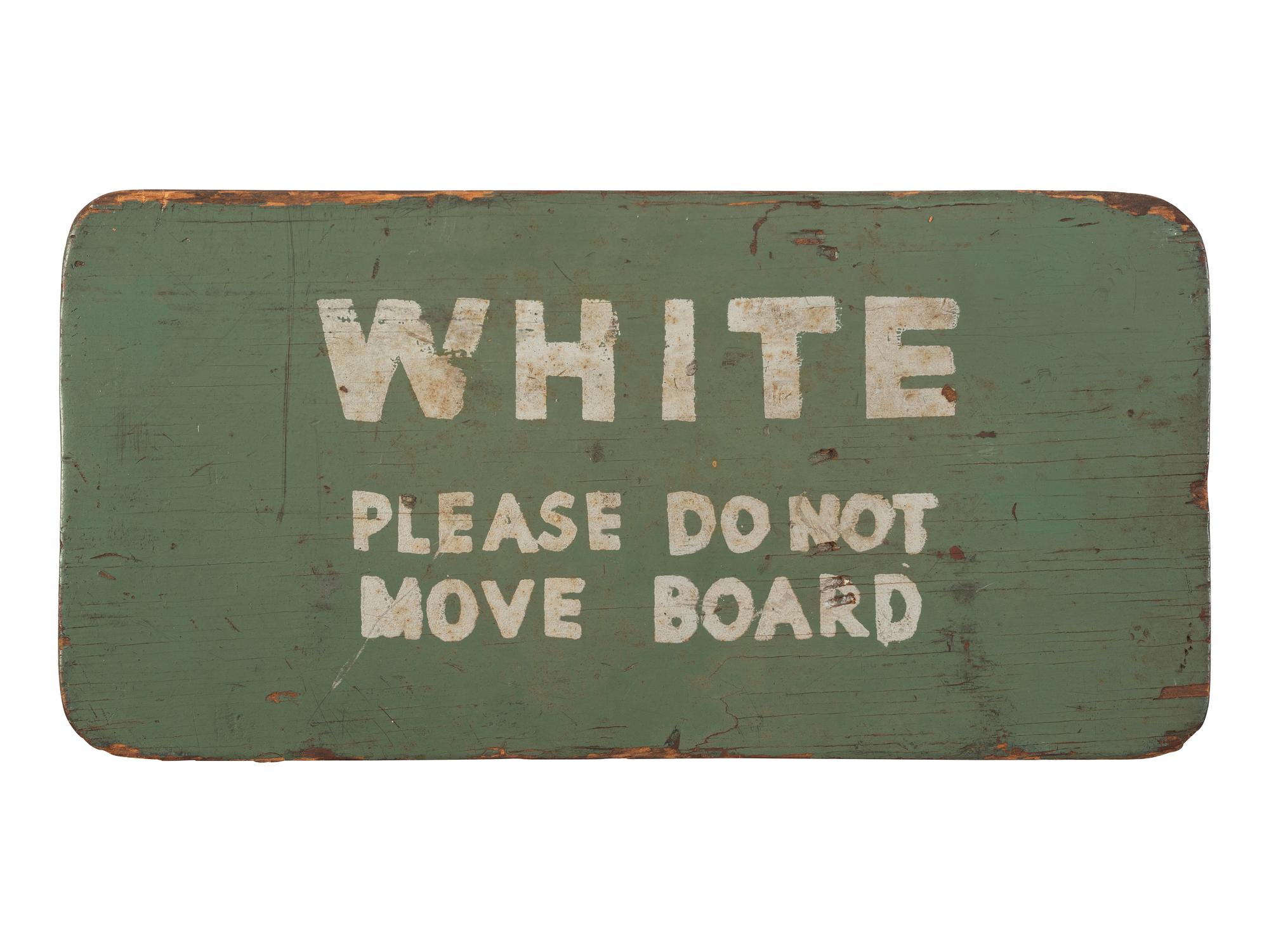 [CIVIL RIGHTS -- SEGREGATION]. Montgomery bus sign, "Colored / Please Do Not Move Board." [Montgomery, AL], [1949].