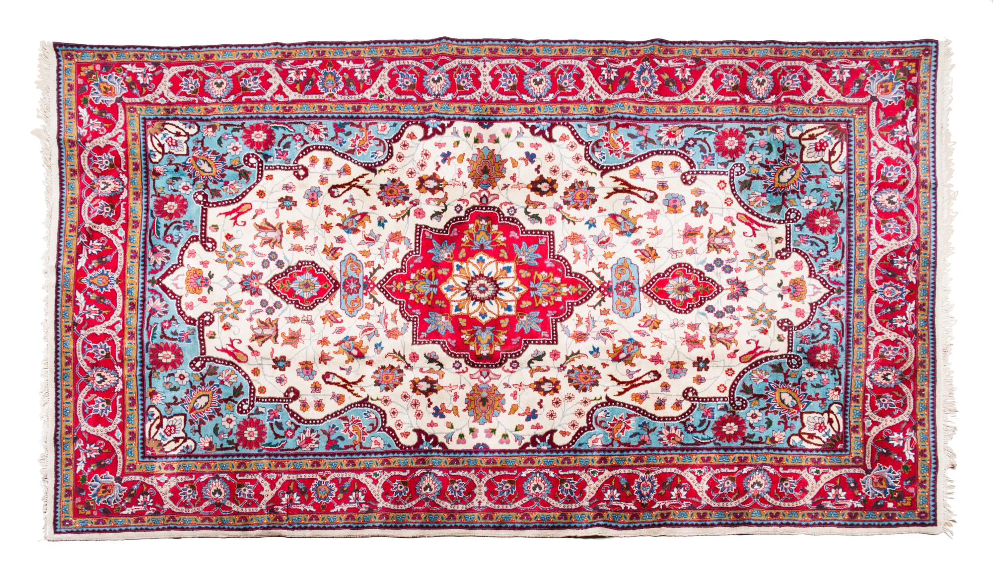 A Persian Style Wool Rug 9 feet 7 inches x 6 feet 3 inches.