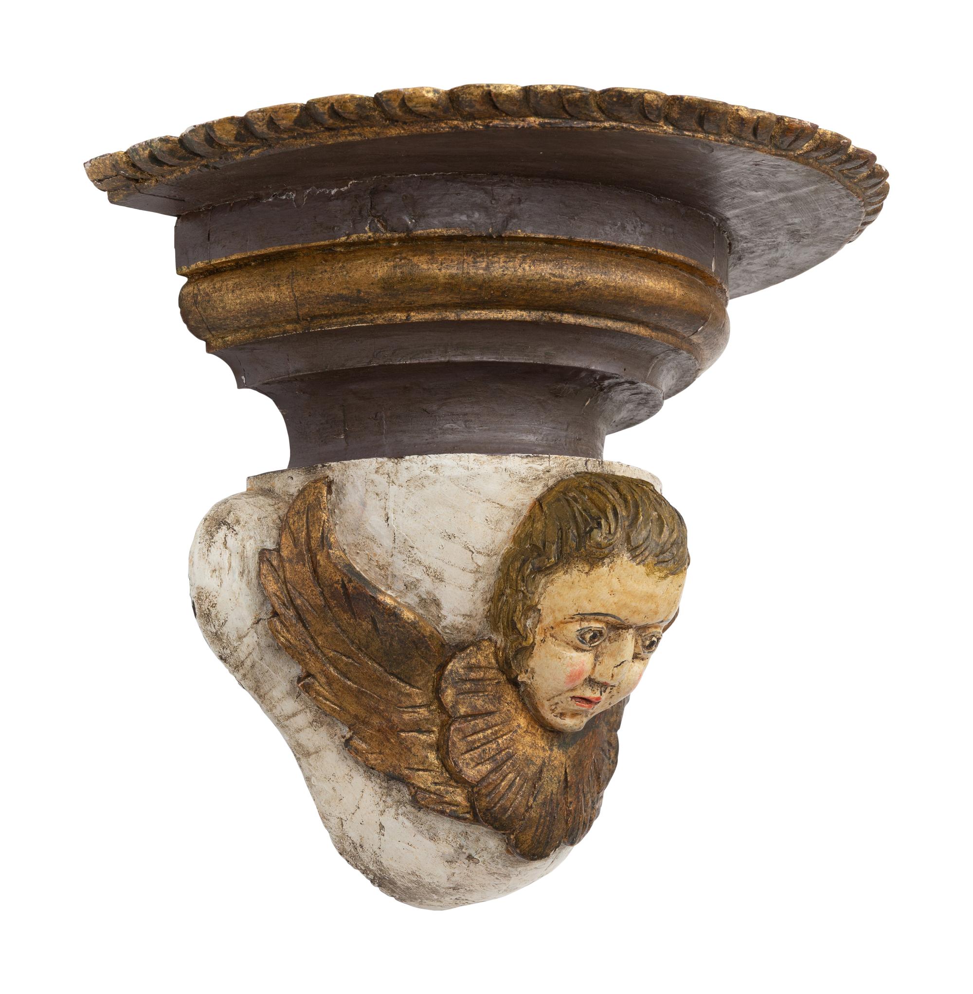 A Pair of Continental Baroque Style Polychromed Putto Mask Wall Brackets