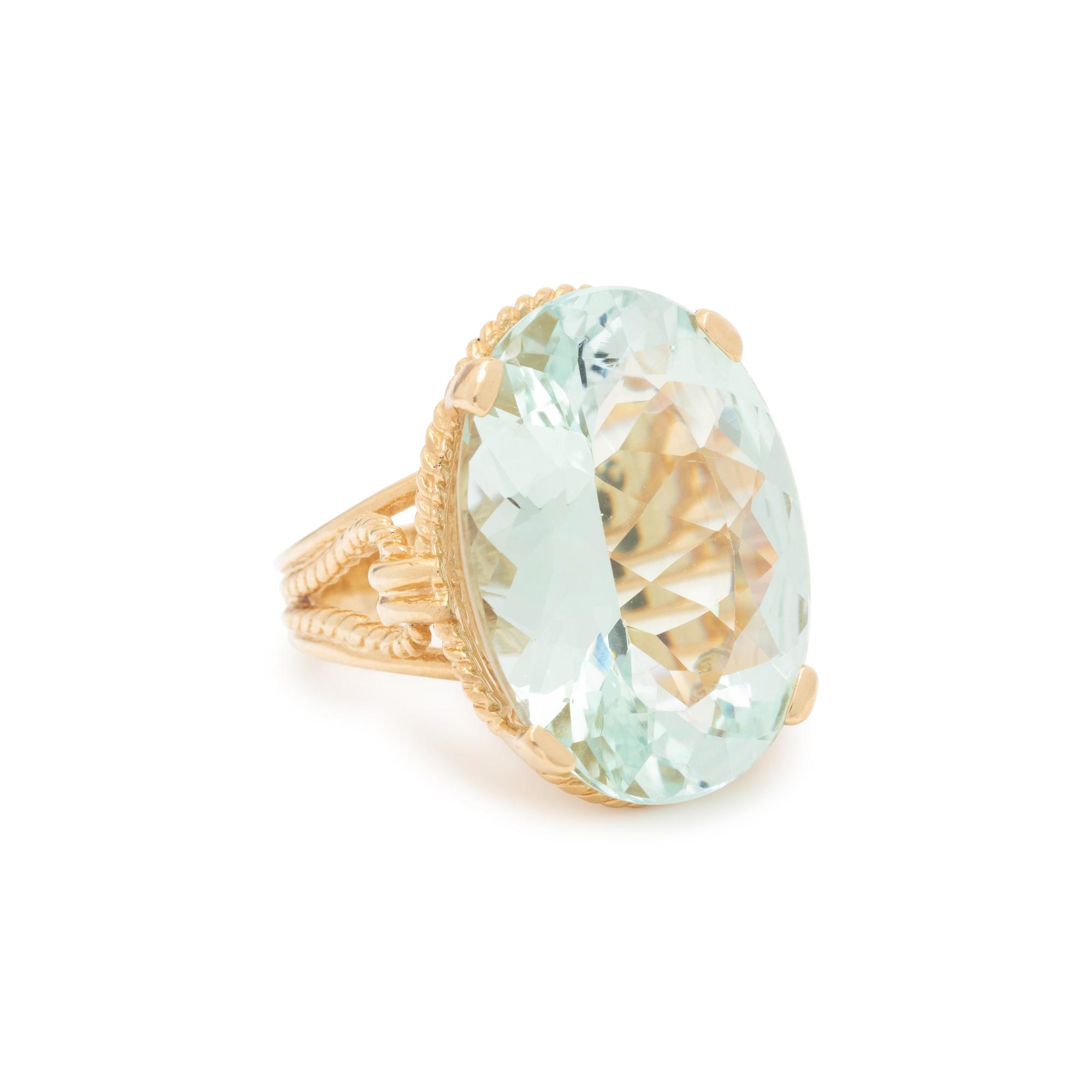 YELLOW GOLD AND AQUAMARINE RING