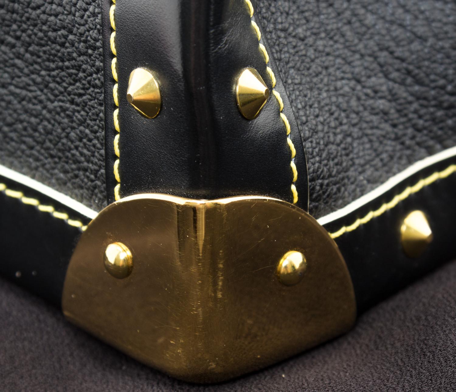 A Louis Vuitton Black Suhali Le Talentueux Handbag, 12.25" x 7" x 3.5".
