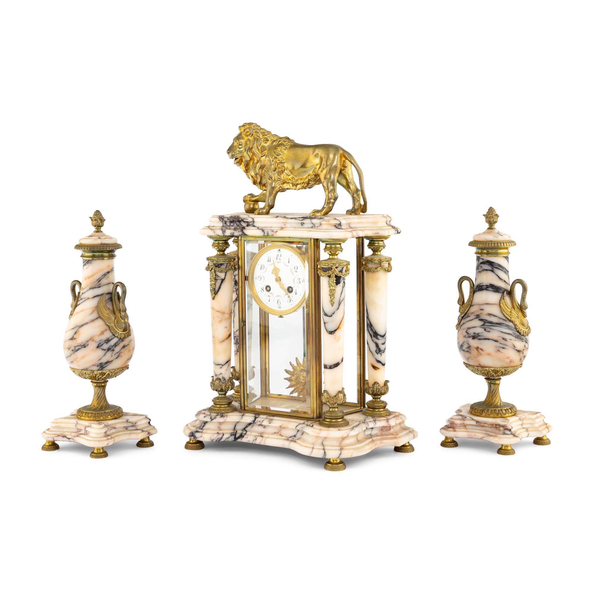 A French Gilt Bronze and Marble Clock Garniture