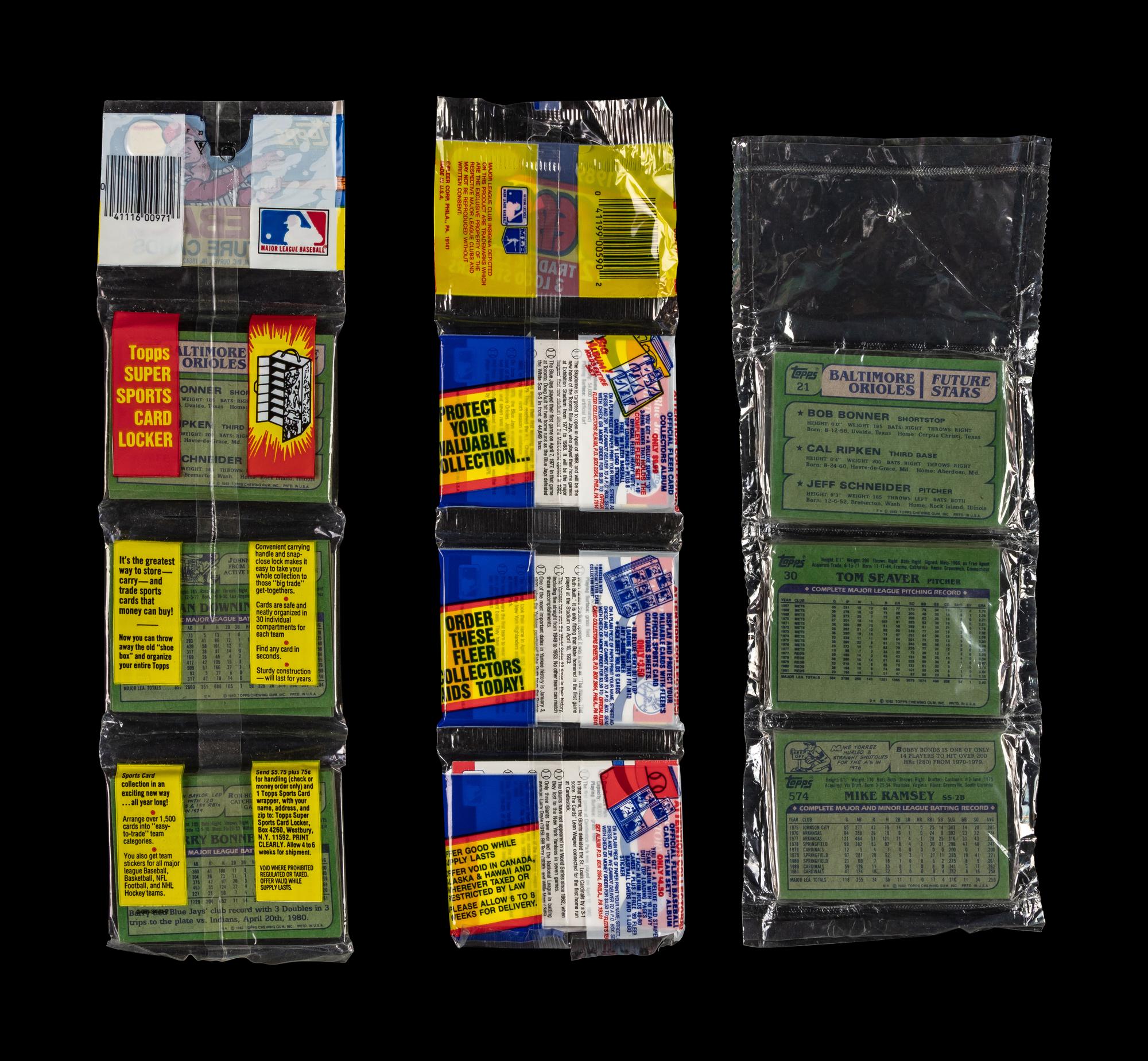 A Group of 1982 Topps Baseball Card Rack Packs with Cal Ripken Jr. Rookie Cards Visible and 1989 Fleer Rack Pack with Billy Ripken Error Visible