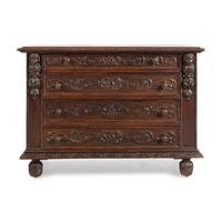 A Spanish Carved Oak Chest of Drawers