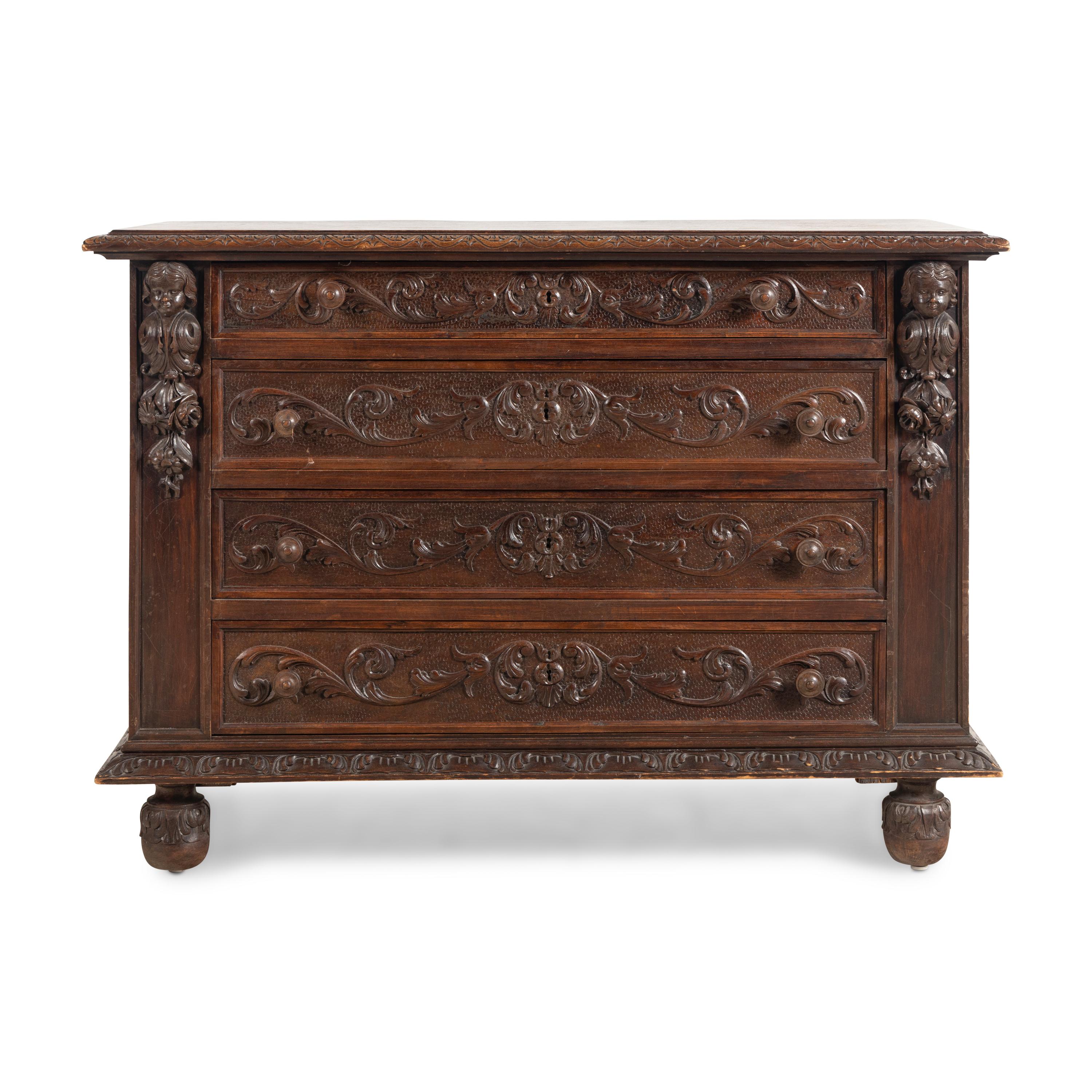 A Spanish Carved Oak Chest of Drawers