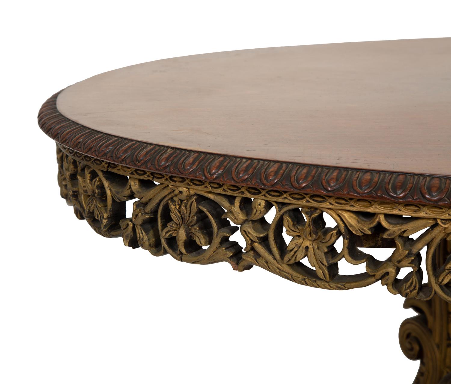 An Anglo-Indian Carved and Parcel Gilt Tilt-Top Table with Lion Form Feet