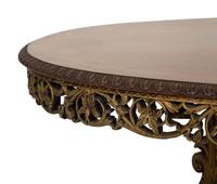 An Anglo-Indian Carved and Parcel Gilt Tilt-Top Table with Lion Form Feet
