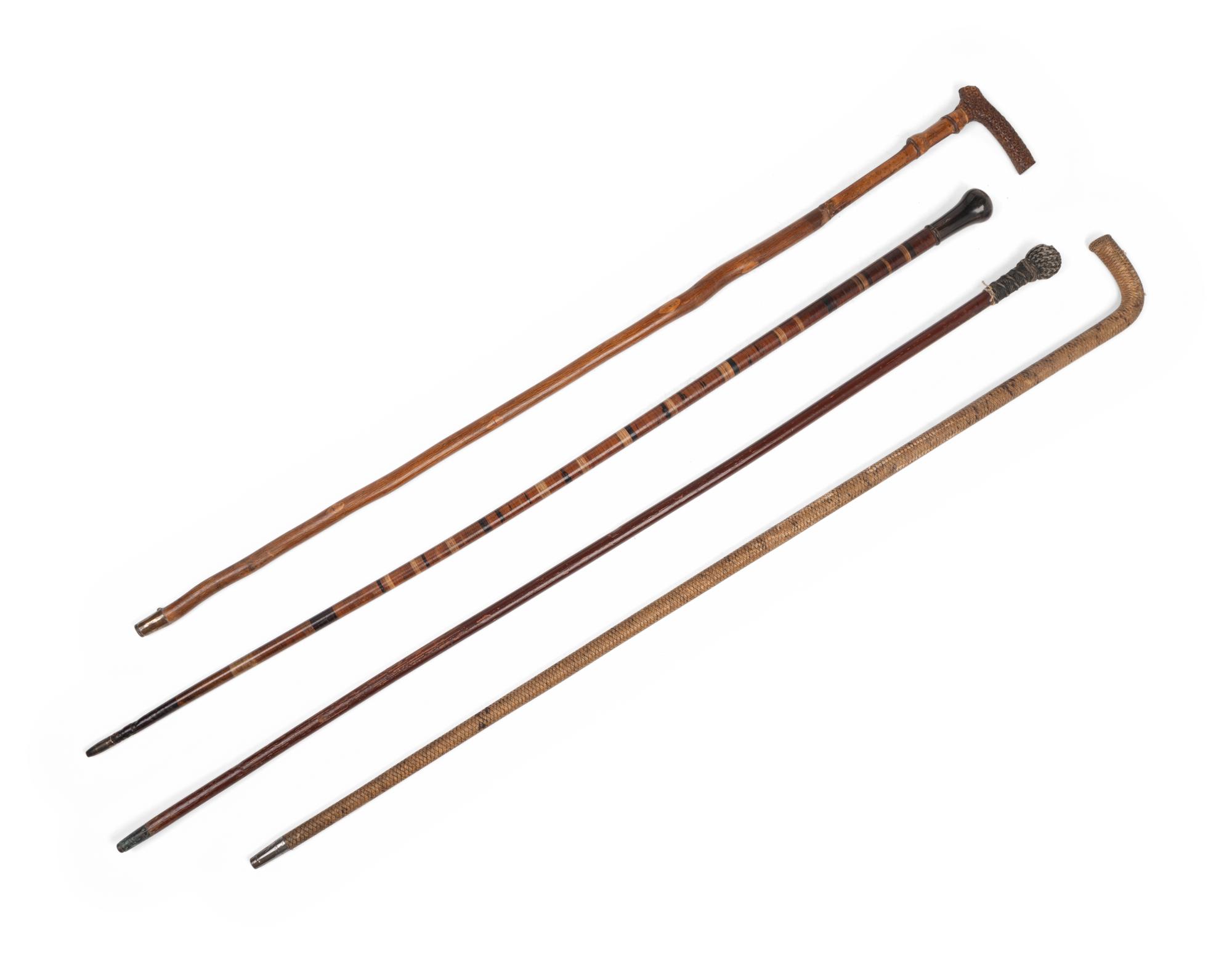 [COMBINED WITH ITEM 2] Four Carved Wood Walking Sticks