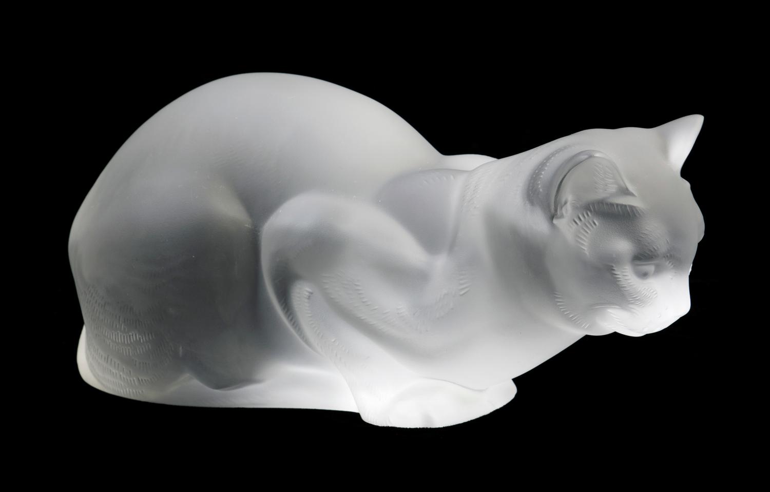 A Lalique Molded and Frosted Glass Figure Height 4 1/2 inches.