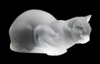 A Lalique Molded and Frosted Glass Figure Height 4 1/2 inches.
