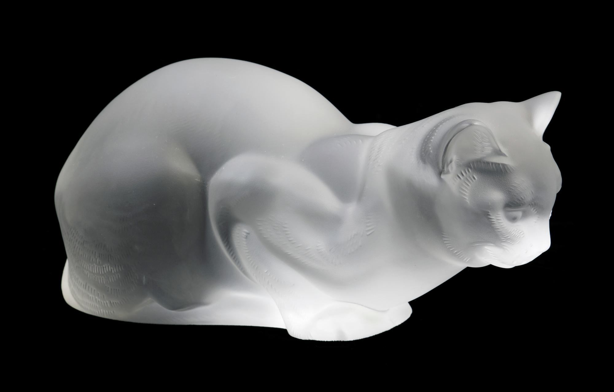 A Lalique Molded and Frosted Glass Figure Height 4 1/2 inches.