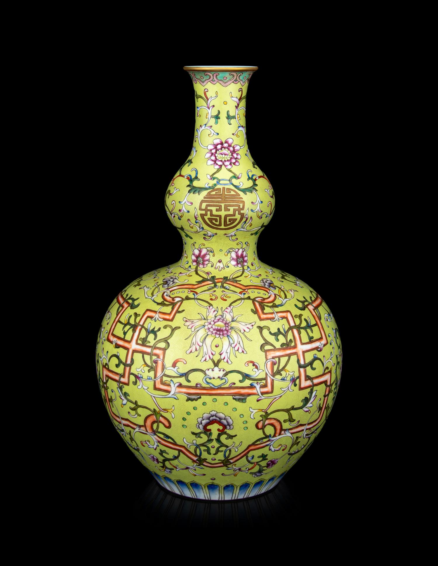 A Chinese Lime Ground Famille Rose Porcelain Double Gourd Vase