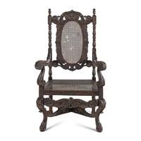 A William and Mary Style Carved Walnut Armchair