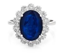 A 14 Karat White Gold, Sapphire and Diamond Ring, 4.20 dwts.