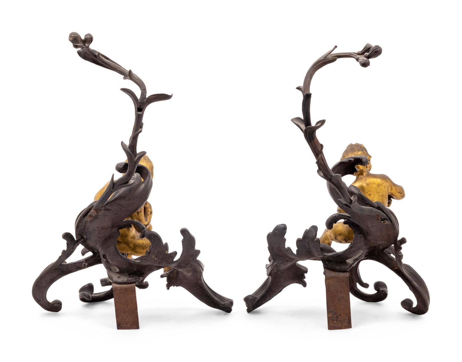 A Pair of Italian Rococo Gilt and Patinated Bronze Figural Chenets