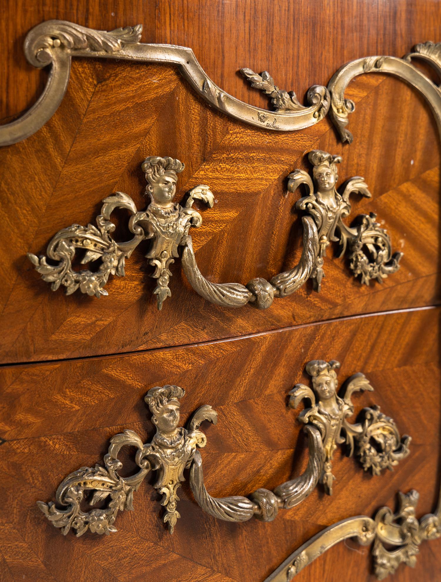 A Louis XV Style Gilt Bronze Mounted Parquetry Marble-Top Commode