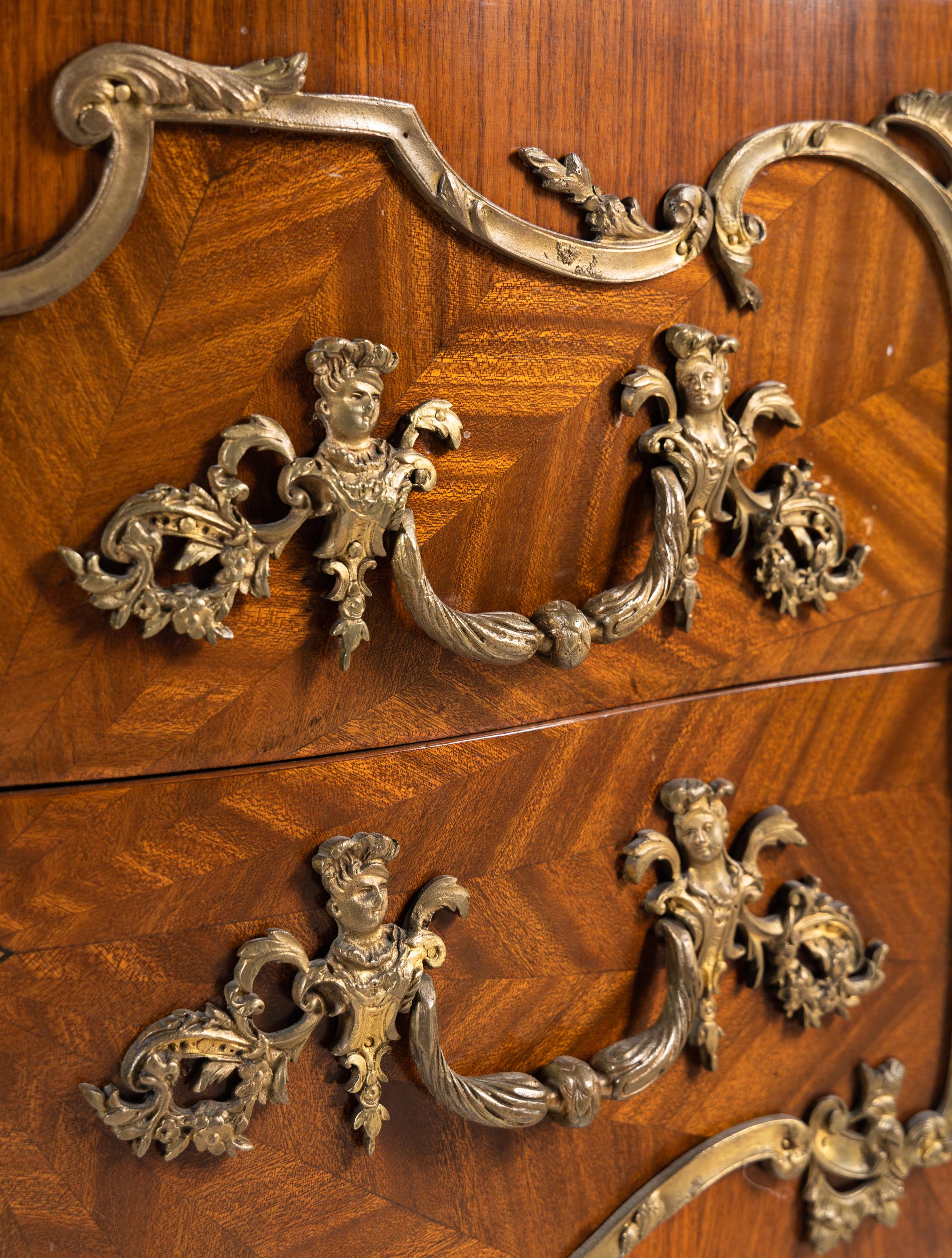 A Louis XV Style Gilt Bronze Mounted Parquetry Marble-Top Commode